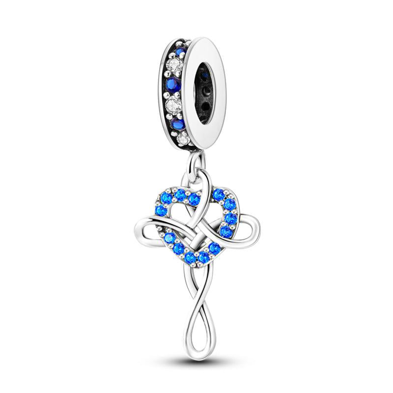 Blue Diamante Heart & Twist Cross Charm